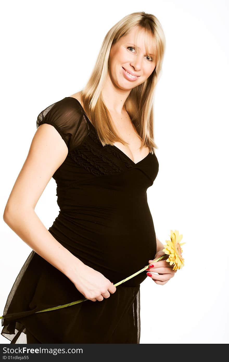 Young beautiful pregnant woman. studio shot.