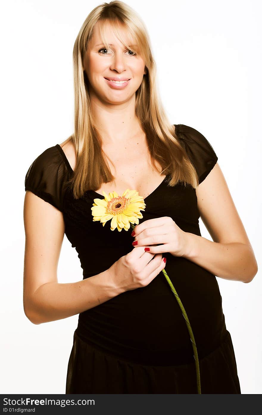 Young beautiful pregnant woman. studio shot.