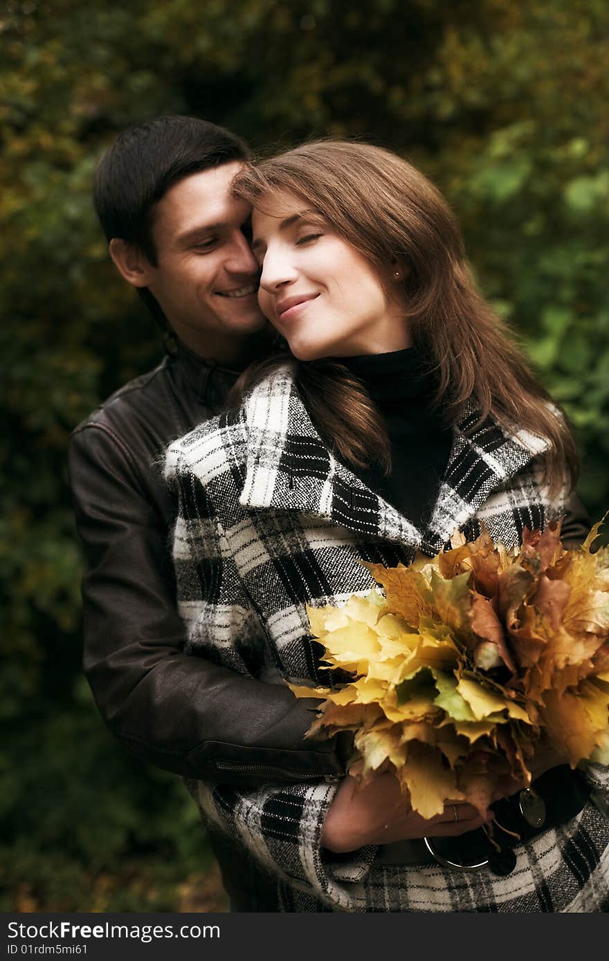 Young  couple in autumn park