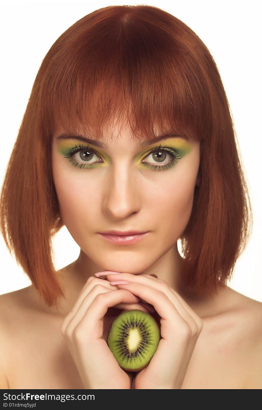 Beautiful woman`s face with kiwi. Beautiful woman`s face with kiwi