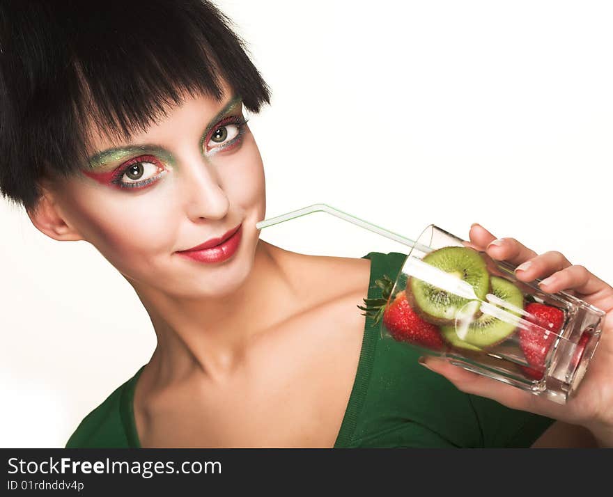 Beautiful woman`s face with kiwi. Beautiful woman`s face with kiwi