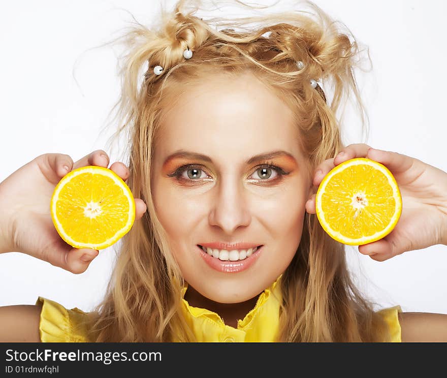 Closeup of a beautiful woman`s face with orange