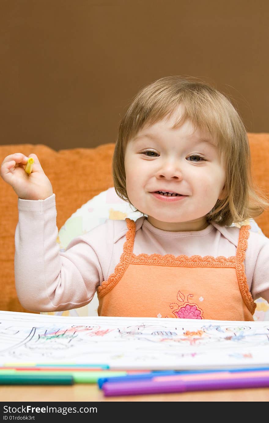 Sweet toddler baby girl drawing