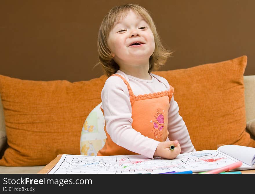 Sweet toddler baby girl drawing