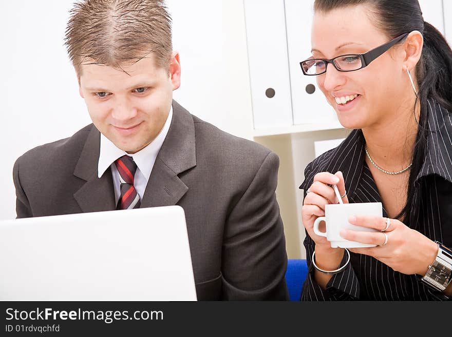 Business man and business woman working in office