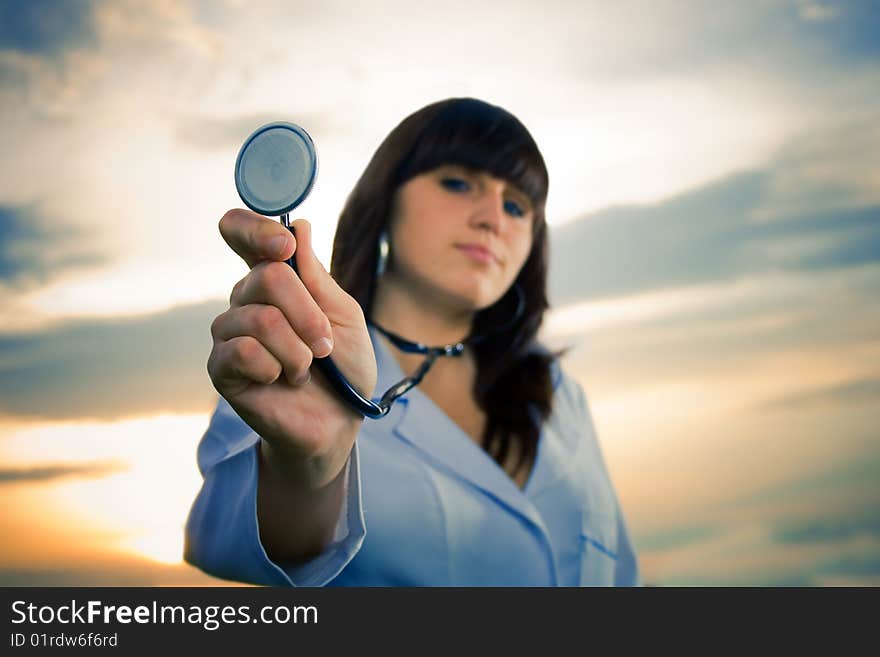 Doctor in background of sky