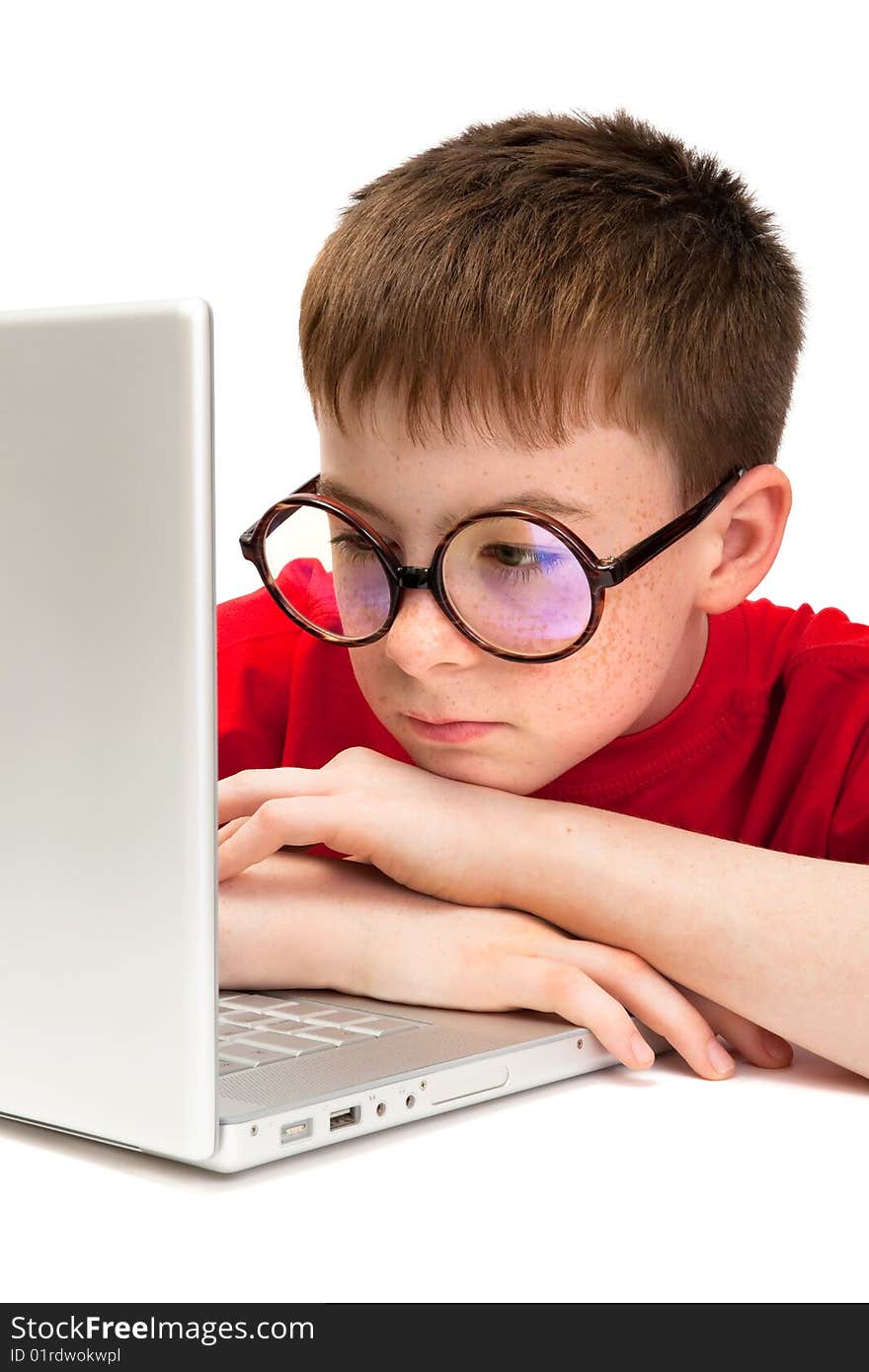 Boy with a laptop on a white background