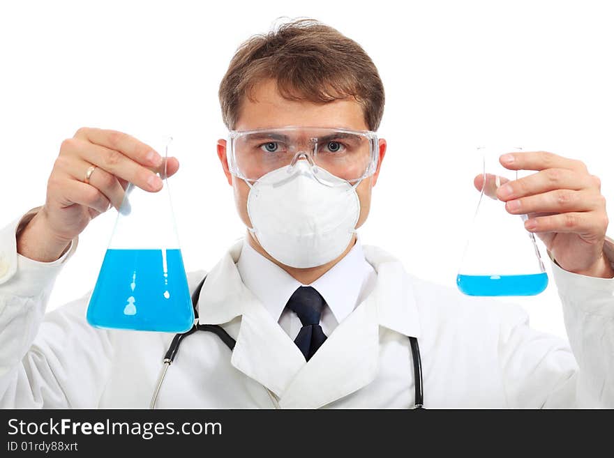 Medical theme: serious doctor working in a laboratory. Medical theme: serious doctor working in a laboratory.