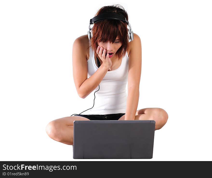 Very seductive young asian woman listening music from the computer