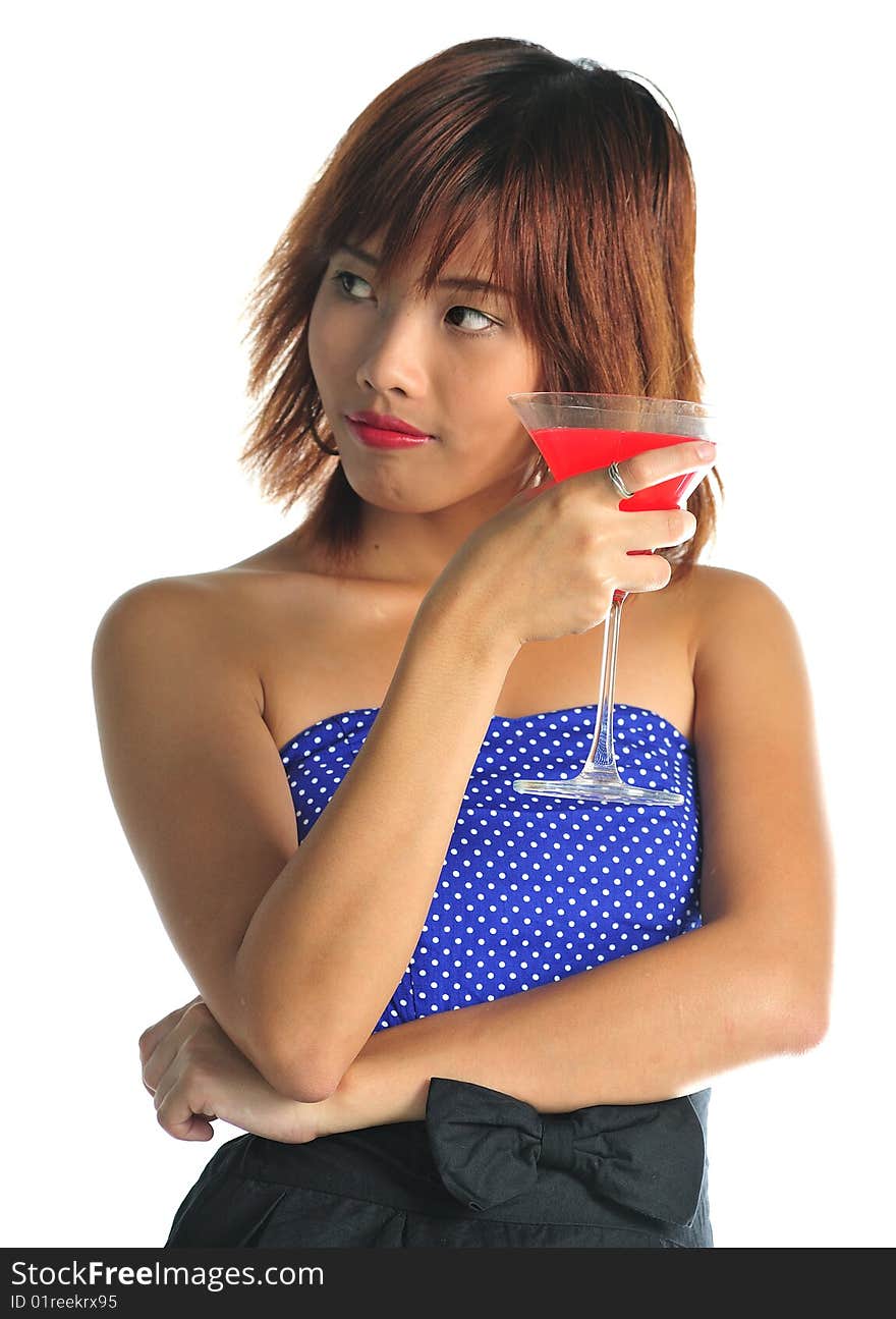 Young asian woman holding a glass of cocktail