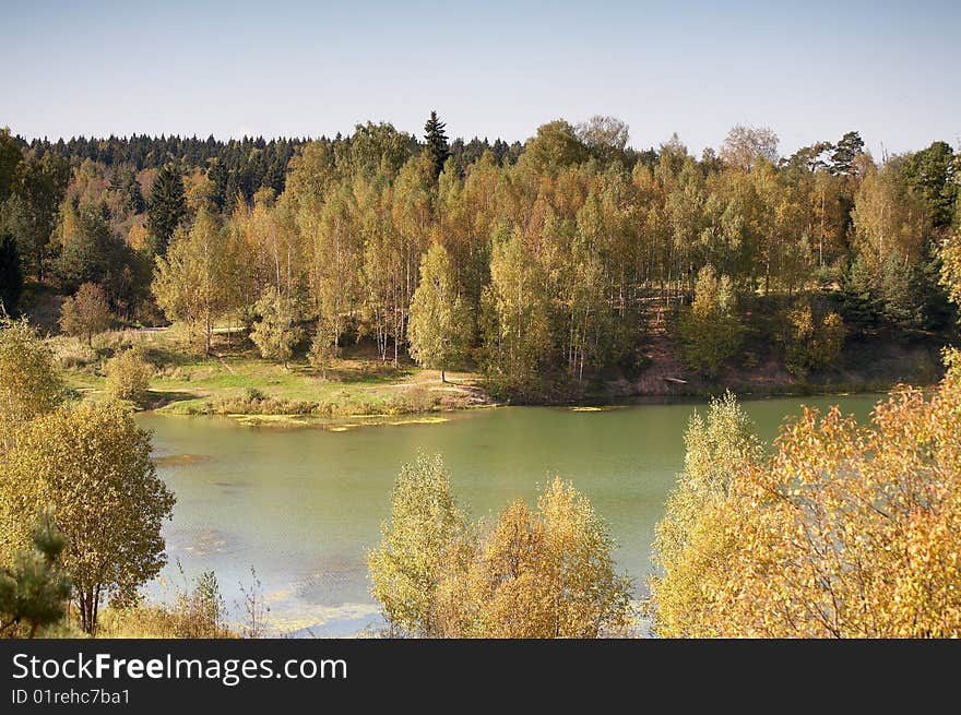 Little forest river in autumn, Russia