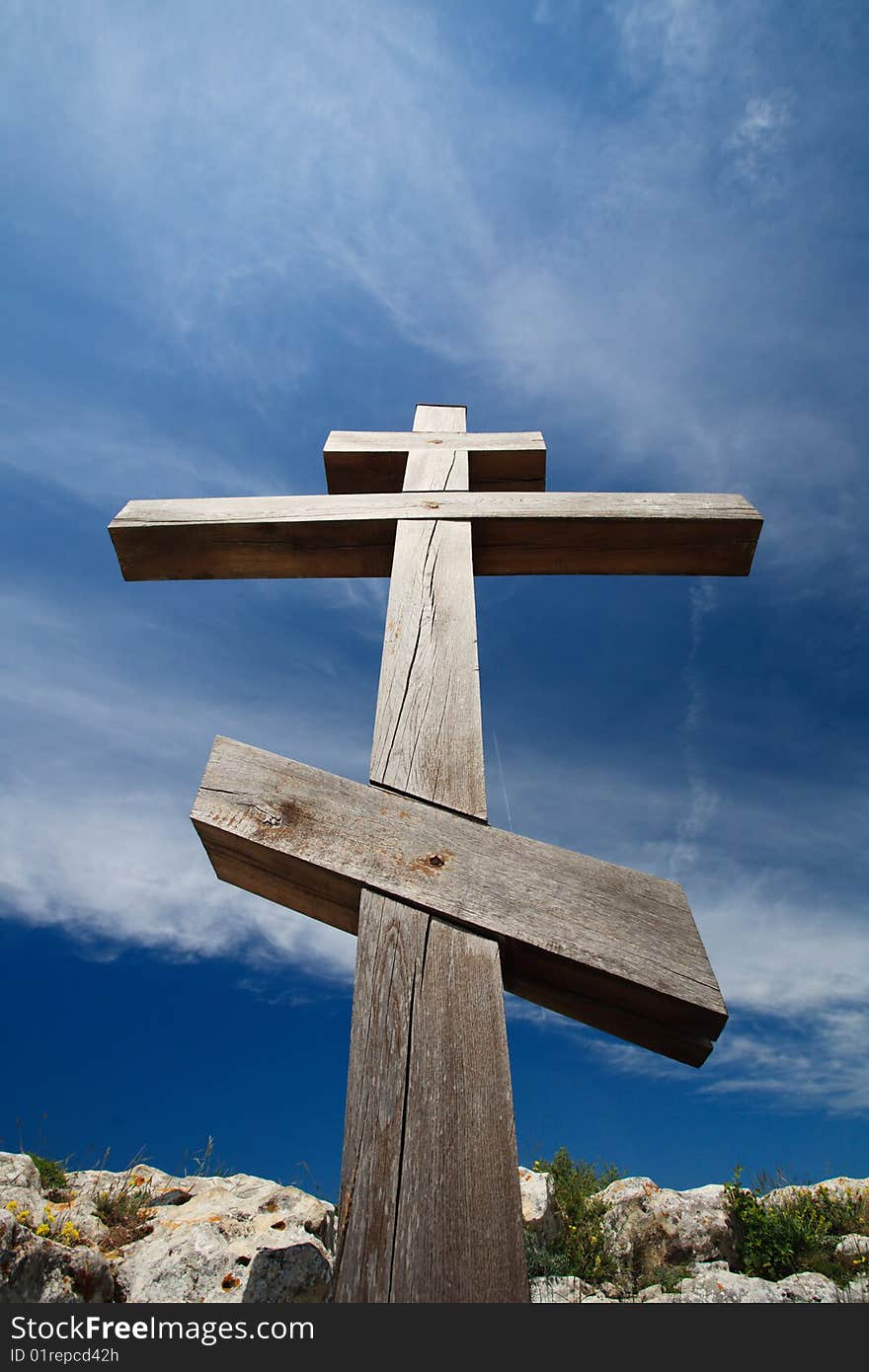 Wooden cross against blue sky