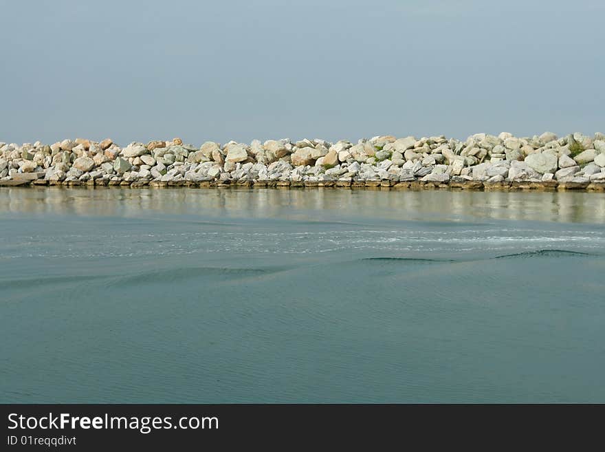 minimalism: rock stripe and water. minimalism: rock stripe and water