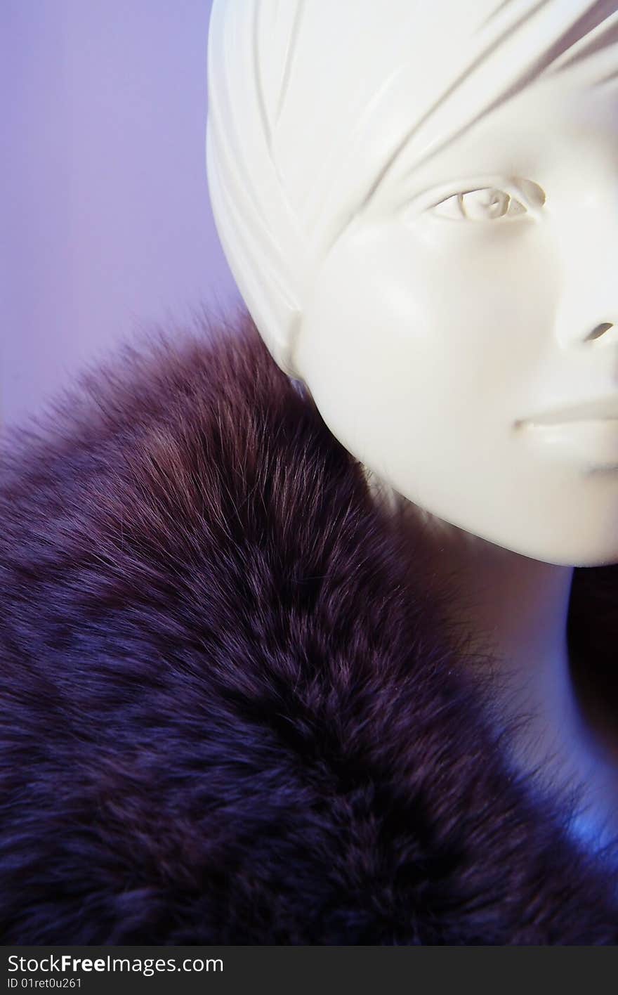 Purple fur collar on a dummy