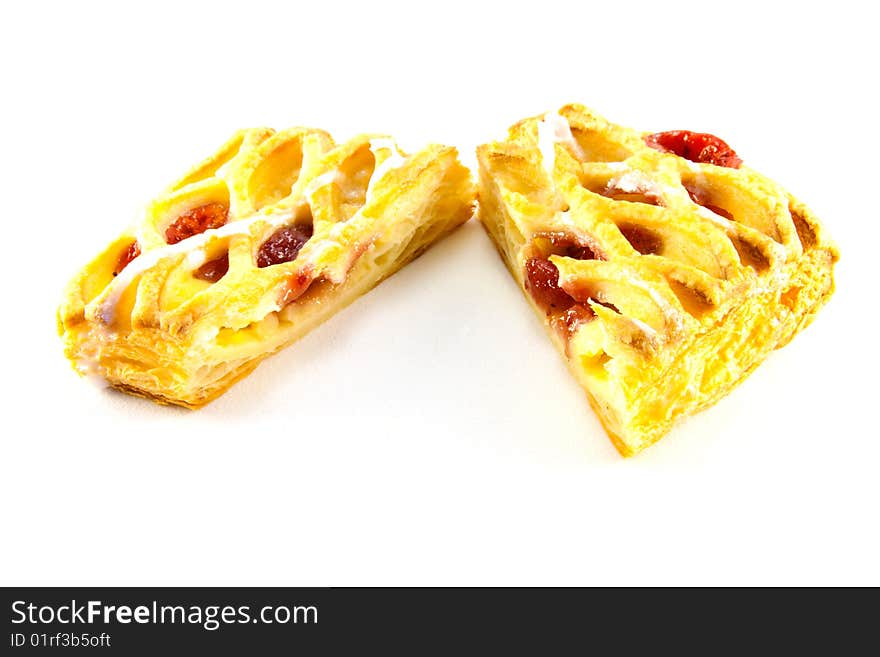 Raspberry and custard danish cut in half with clipping path on a white background. Raspberry and custard danish cut in half with clipping path on a white background