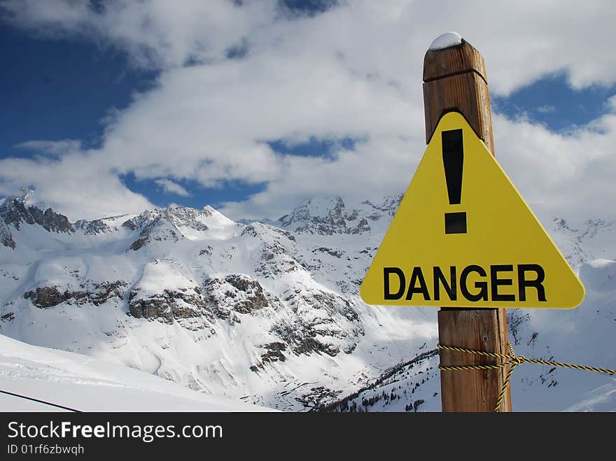 Warning sign for danger in the mountain