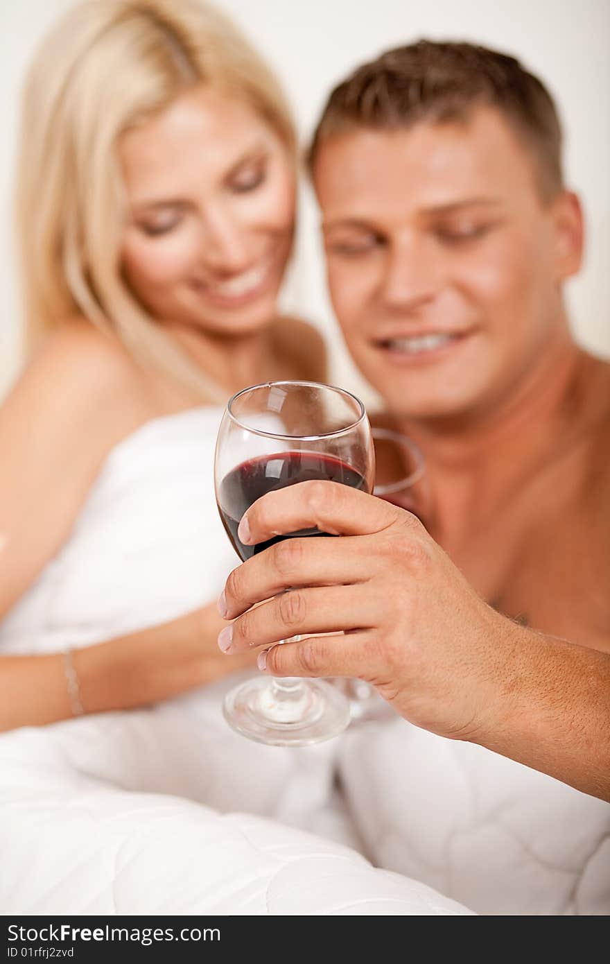 Young Couple Toasting Champagne