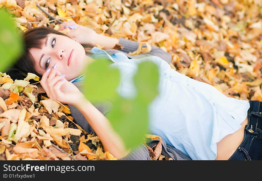 Pretty Woman With Yellow Leaves