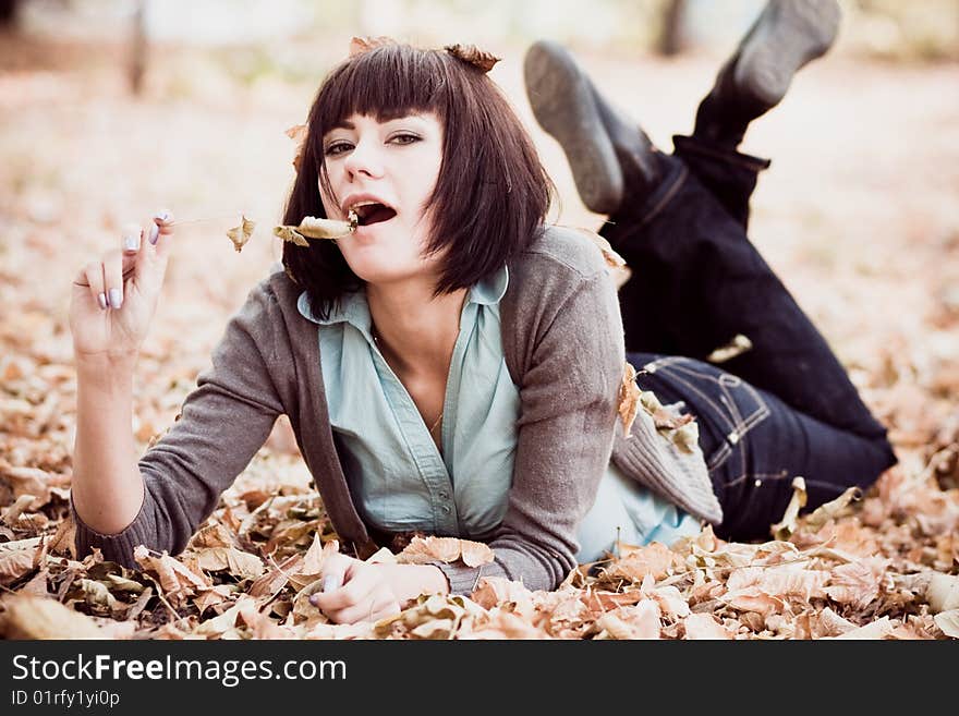 Pretty Woman With Yellow Leaves