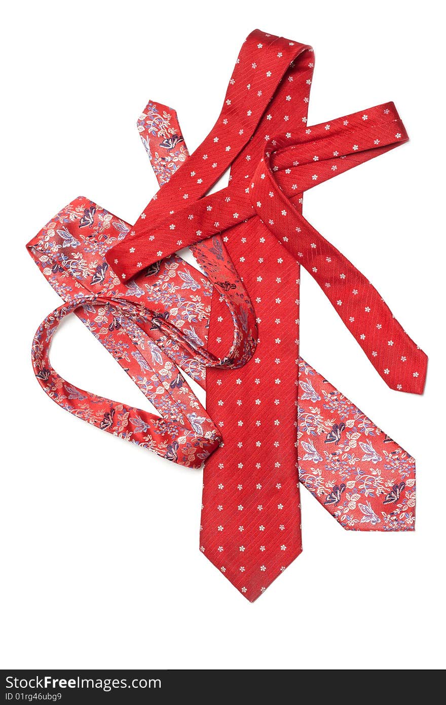 Male red ties strewn on white background