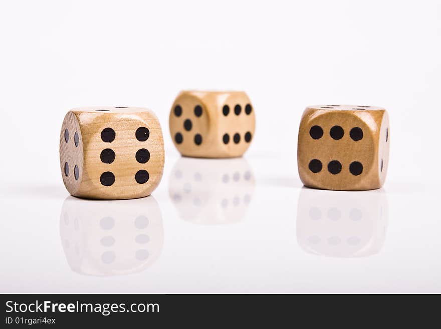 wood dice on white background.