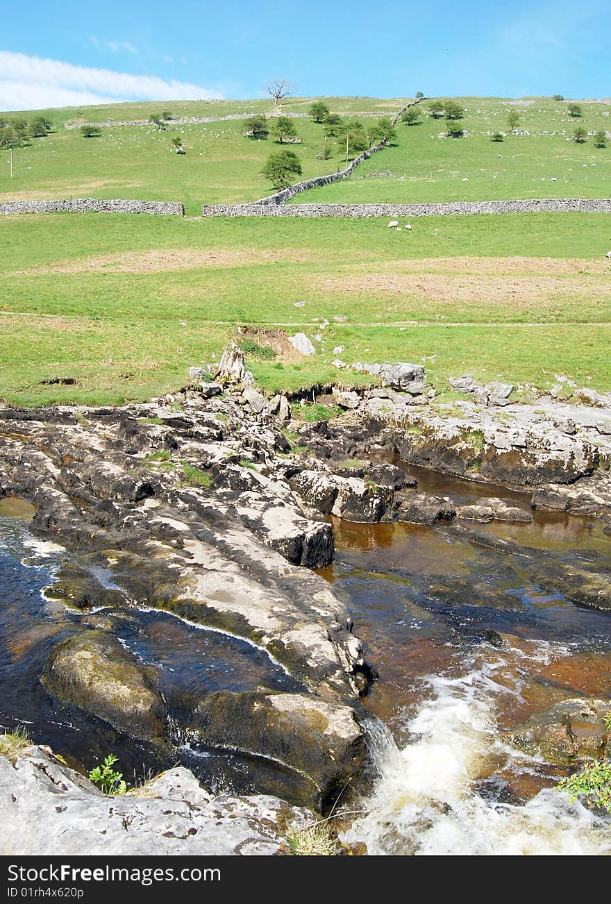 Water flowing over rocks in Yorkshire Dales scenery. Water flowing over rocks in Yorkshire Dales scenery