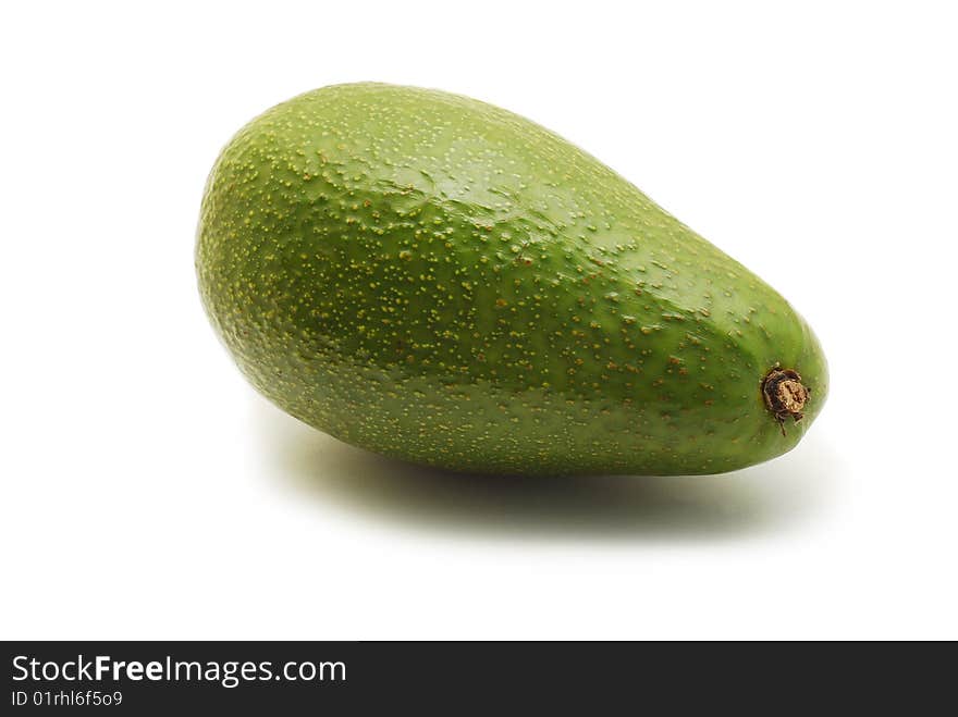 Green avocado isolated on white background