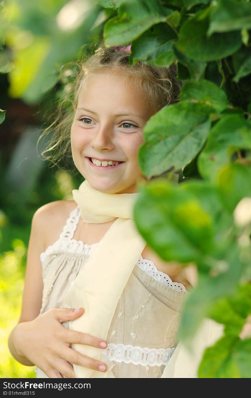 Photo of the smiling girl in solar wood. Photo of the smiling girl in solar wood