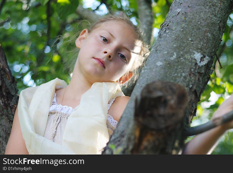 The cute girl among trees