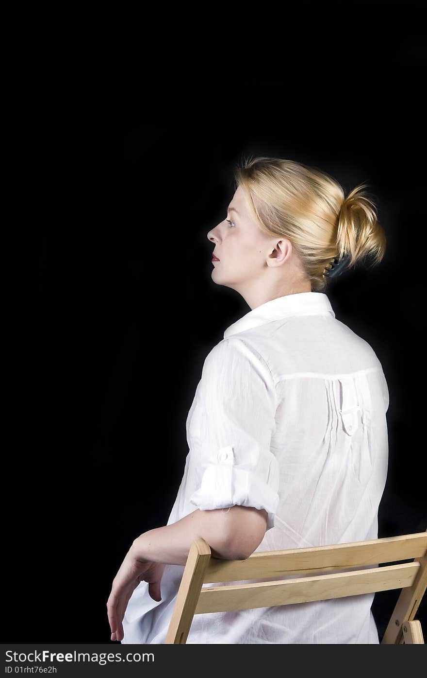 Studio portrait of a beautiful woman with blond hair