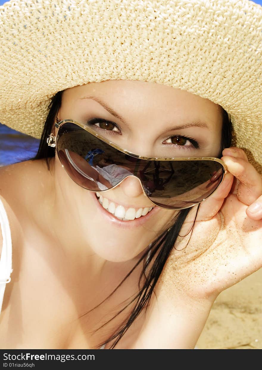 Smiling Woman On The Beach