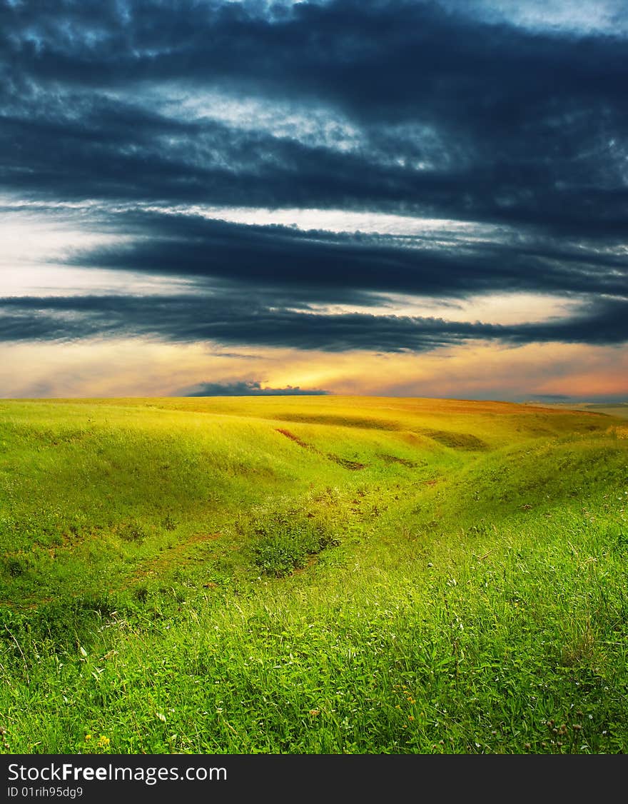 Dark sunset over rural landscape