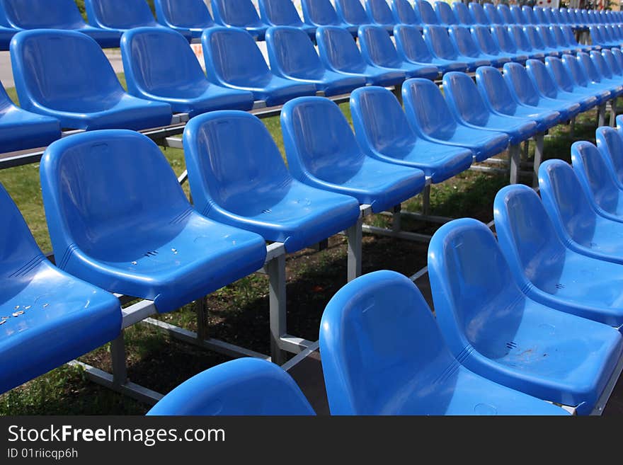 Blue Seats At The Football Stadium