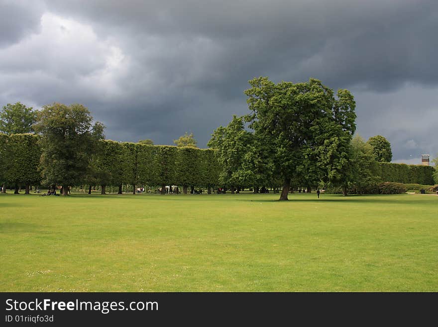 Green park and the stormy clouds. Green park and the stormy clouds