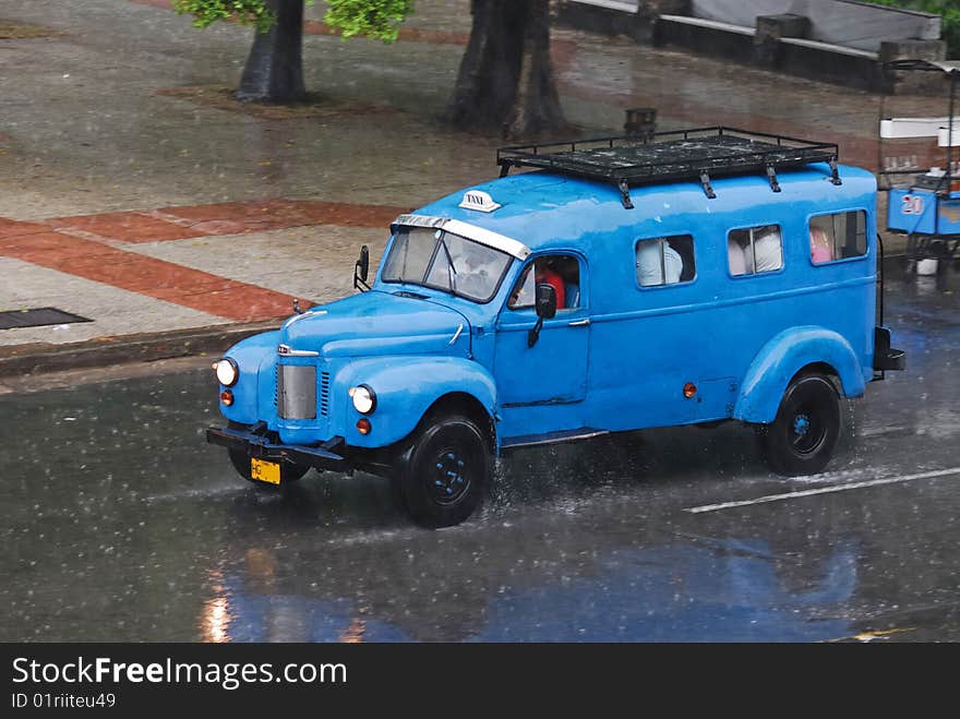 Overcrowded old style bus taxi for Cuban residents in Havana. Overcrowded old style bus taxi for Cuban residents in Havana