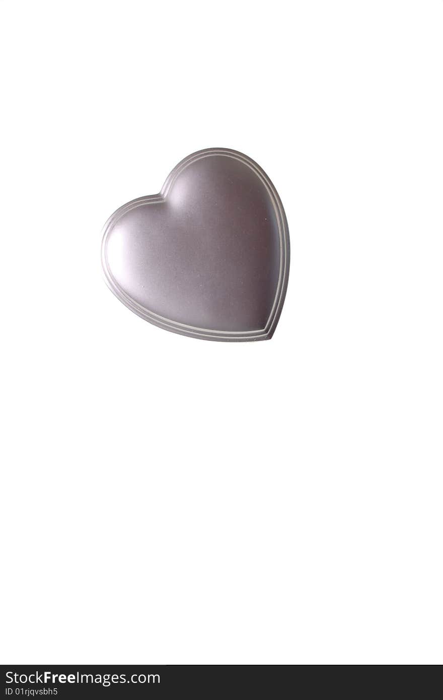 Silver heart on isolated white