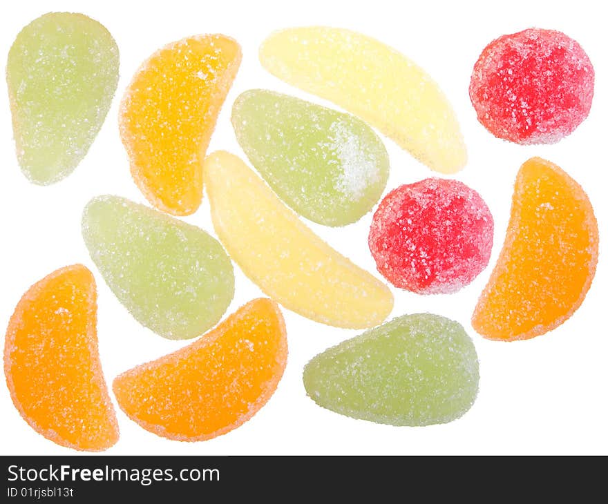 Colorful fruit candies isolated on white.