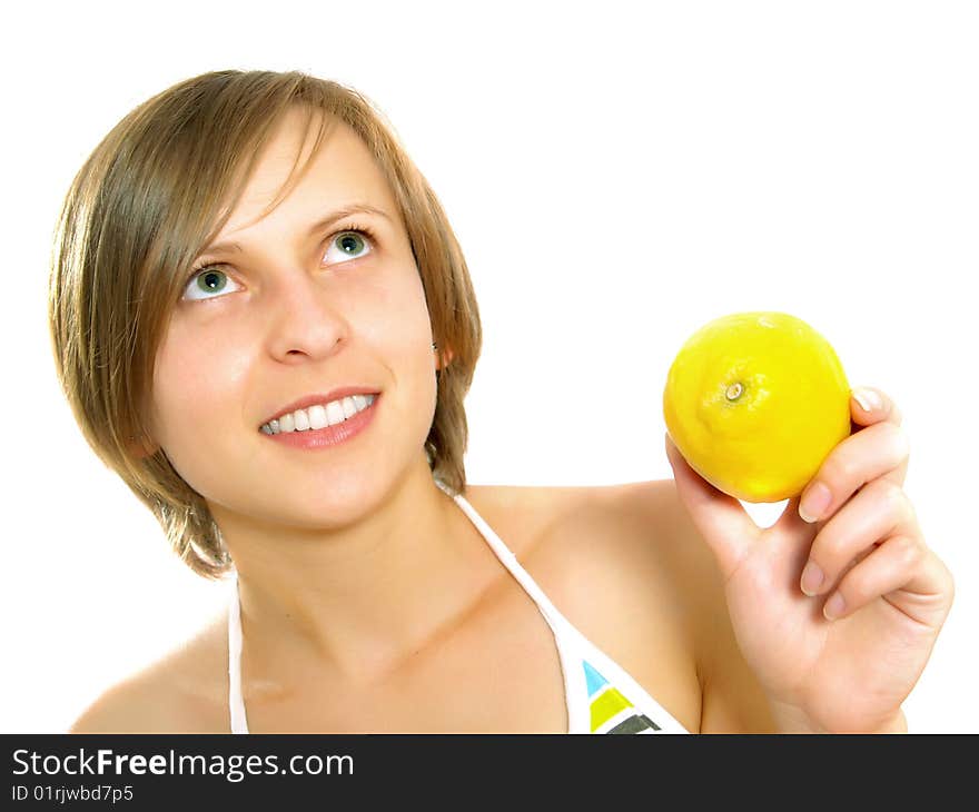 Smiling young lady with lemon