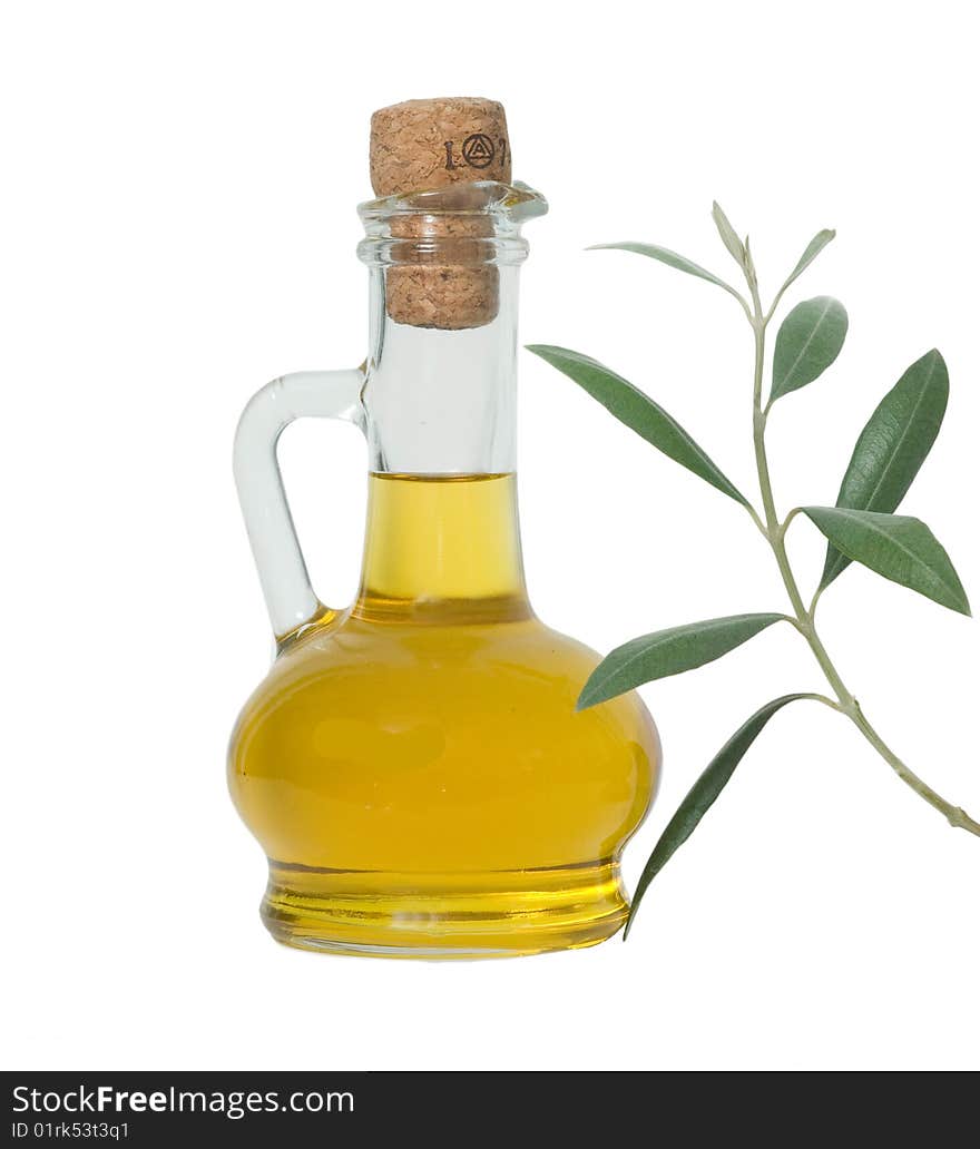 Bottle of olive oil and olive branch isolated on white background