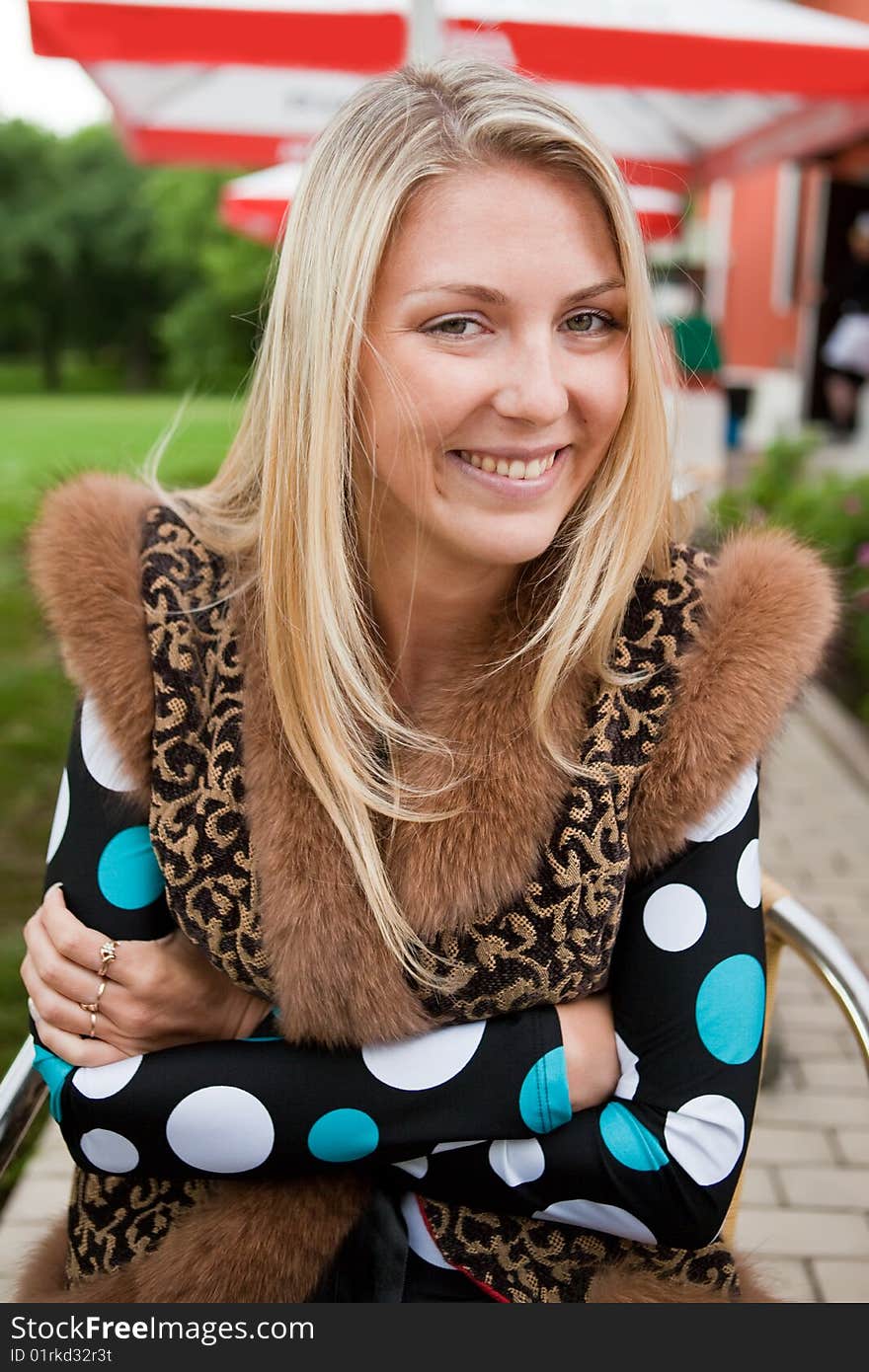 Portrait of the beautiful girl in cafe