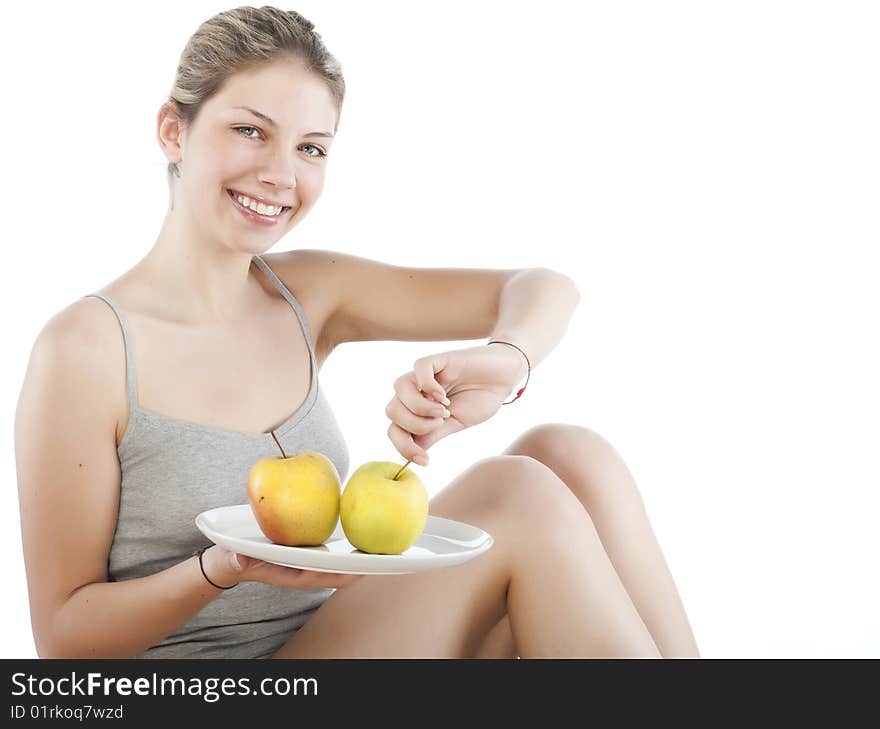 Beautiful young woman holding a  apple