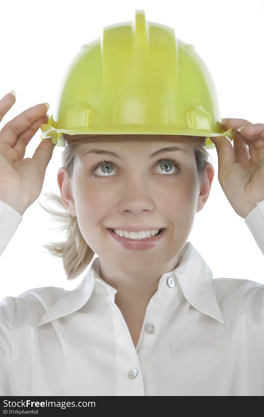 Attractive young engineer over a white background