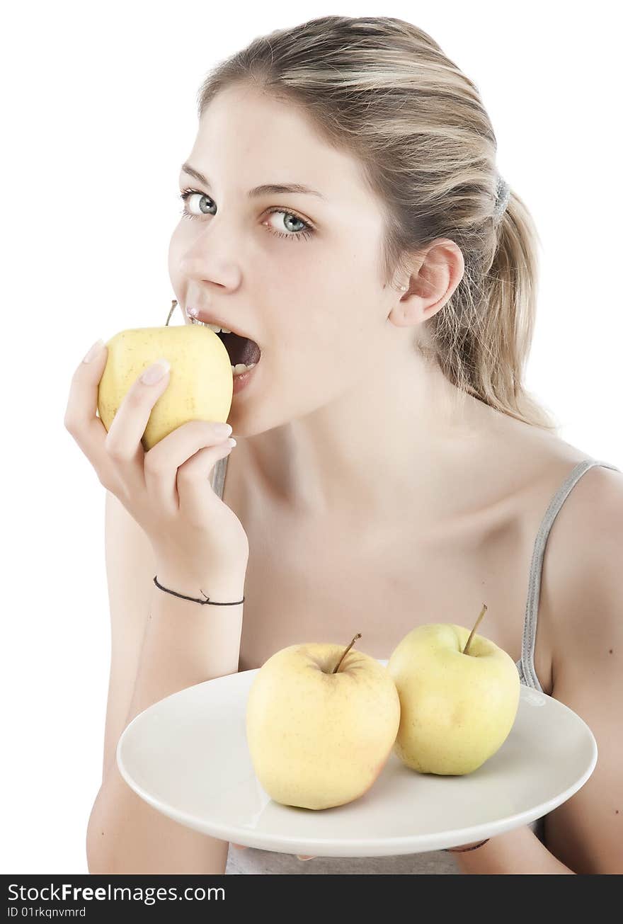 Beautiful young woman holding a  apple