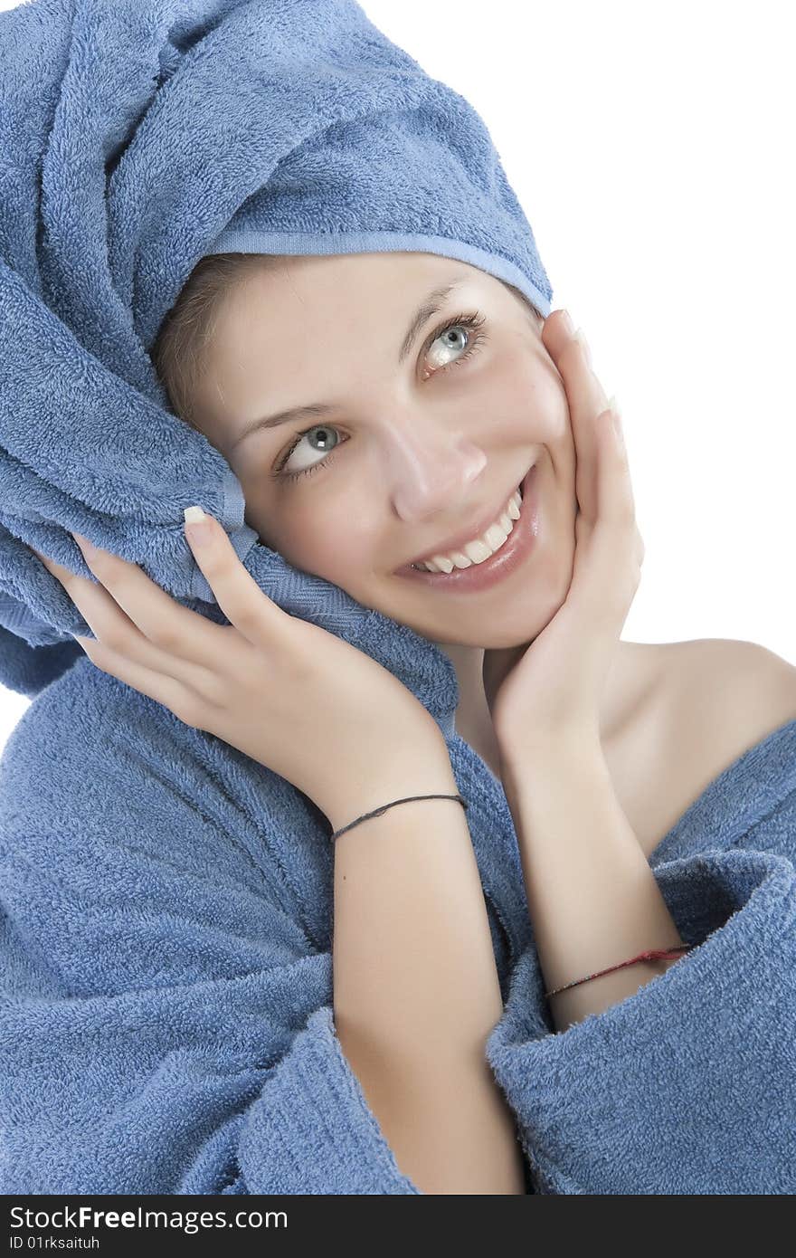 Young woman dressed blue bathrobe