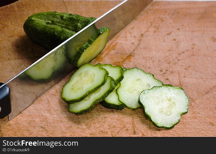 Knife and cucumber