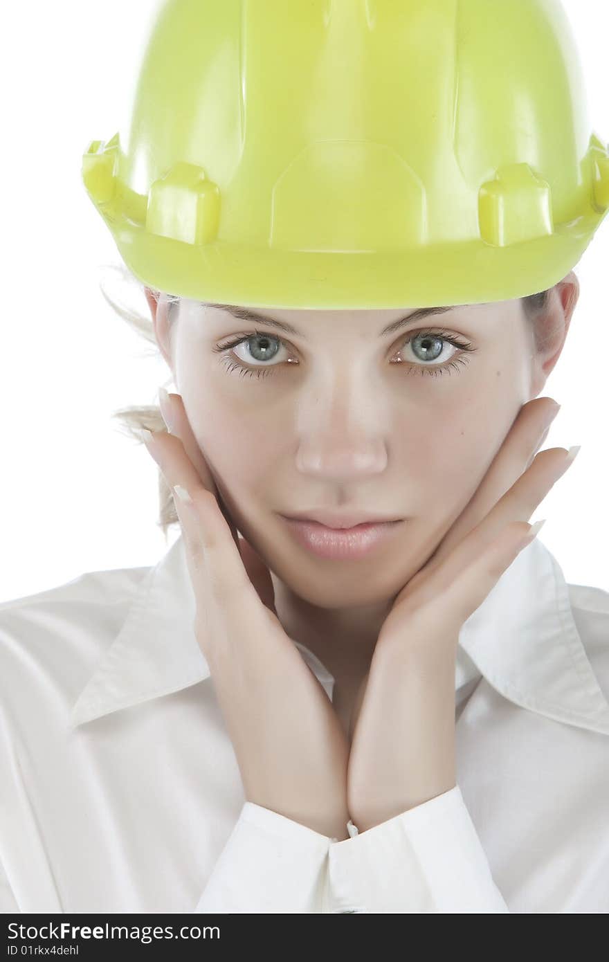 Attractive young engineer over a white background