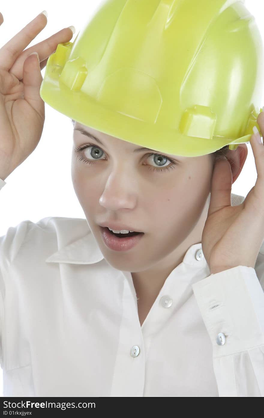 Attractive young engineer over a white background