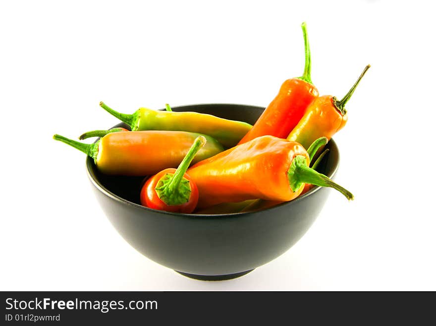 Chillis in a Black Bowl