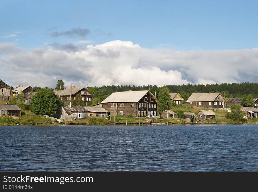 Old Karelian village in Russia, view from water. Old Karelian village in Russia, view from water