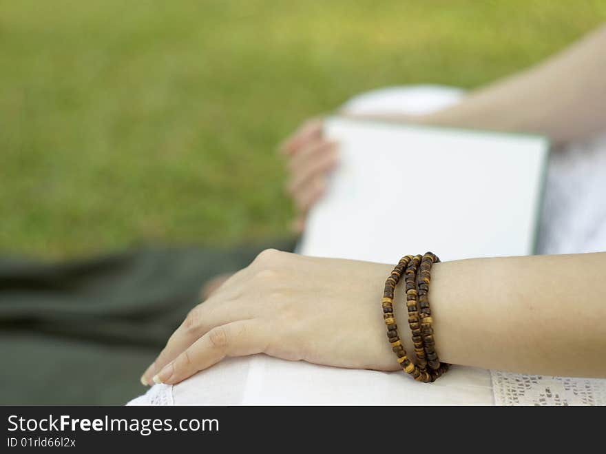 Reading book outdoors